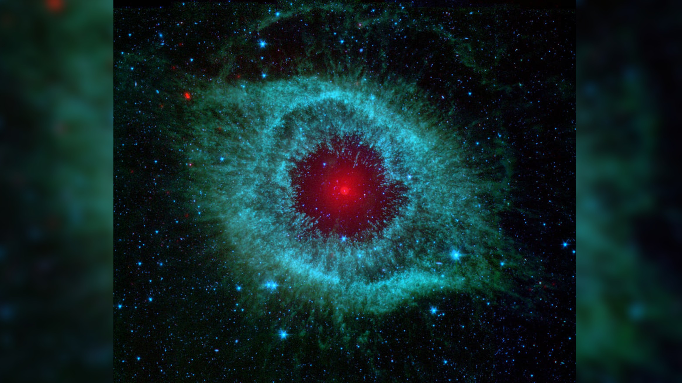 An image of the Helix Nebula taken by the Spitzer Space Telescope