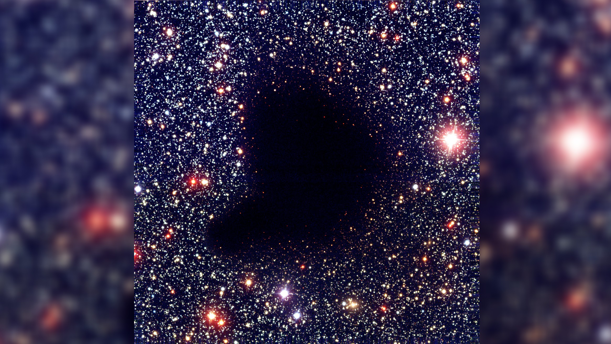 A composite image of the dark Barnard 68 nebula