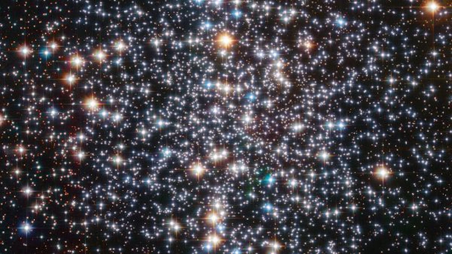 Messier 4 image filled with bright stars against a black background of space.