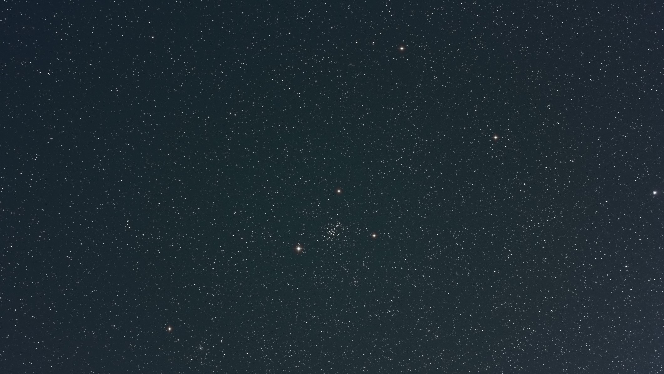 View of the constellation of Cancer with the naked eye. At the center, we can see the famous stars cluster named M 44 (Messier 44)